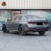 Обвес для BMW 7 серии в стиле старый в новый черного цв