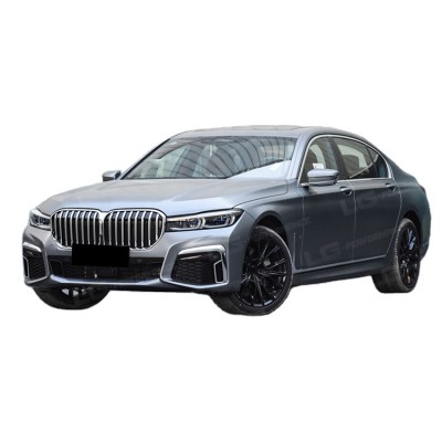 Обвес для BMW 7 серии в стиле старый в новый черного цв