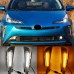 Дневные ходовые огни Toyota Prius белого цвета с желтым