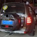 Задний фонарь Mitsubishi Pajero Montero красный АБС + с